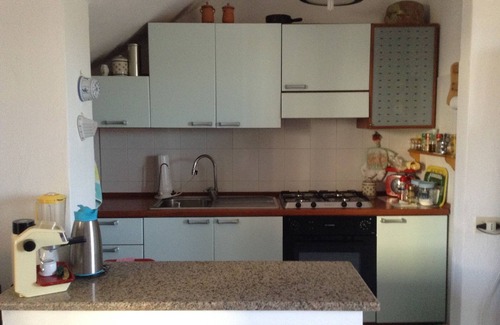 Posada Apartment | Family Beach House Steps from the Ocean in Medieval Village