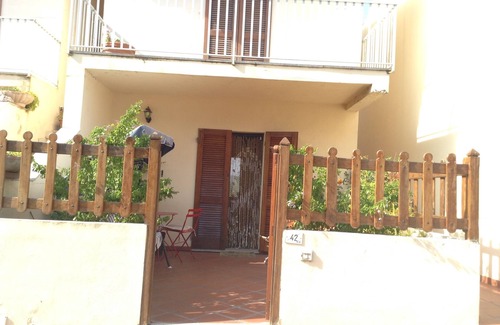 Posada Apartment | Family Beach House Steps from the Ocean in Medieval Village