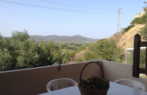 Posada Apartment | Family Beach House Steps from the Ocean in Medieval Village