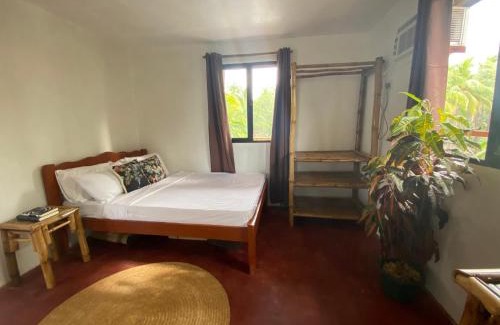 Bayawan City Bed & Breakfast | Cozy Beach House with Oceanfront Views and Private Access