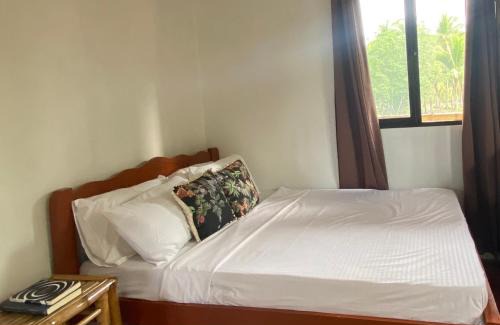 Bayawan City Bed & Breakfast | Cozy Beach House with Oceanfront Views and Private Access