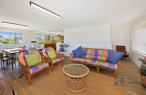 Woodgate House | Beach House Escape! Highset holiday Home one street from the Beach.