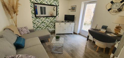 Arromanches-les-Bains House | Discover Maison & Patio: Historic Center Steps from the Beach