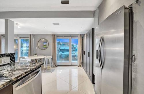 Hendricks and Venice Isles Apartment | Modern Waterfront Apartment with Patio - 10/10 Guest Rated
