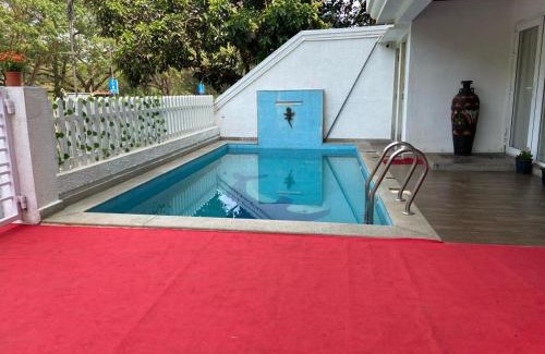 Caranzalem Hotel | Relaxing Beach Paradise with Pool & Child-Friendly Amenities
