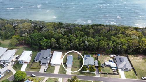 Toogoom House | Beachfront Retreat with Pizza Oven and Ocean Views