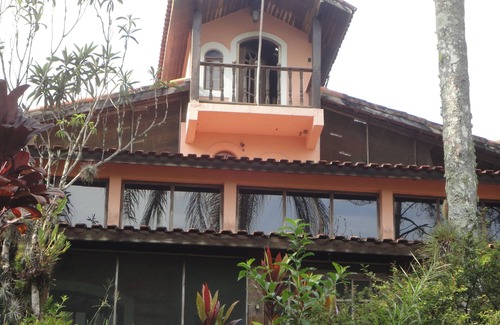 Sao Sebastiao Cottage | Relaxing Beachfront Retreat with Scenic Waterfalls and Spa