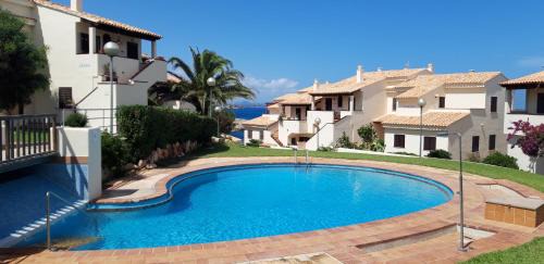 Cala Murada Apartment | Oceanfront Apartment with Big Terrace & Pool Access