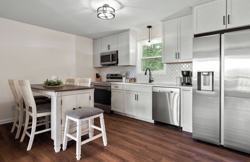 Baxter House | Relax in a Hot Tub with Lake View and Beach Access