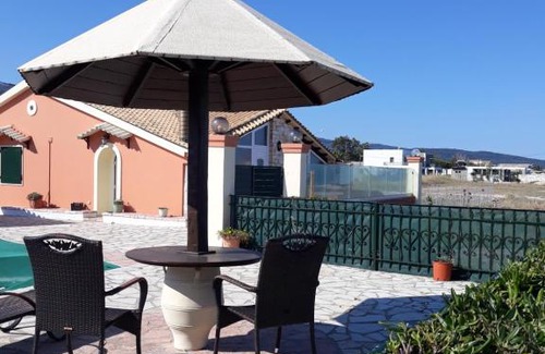 Almiros Beach Villa | Oceanfront Beach Villa Athanasia with Pool & Pet Friendly