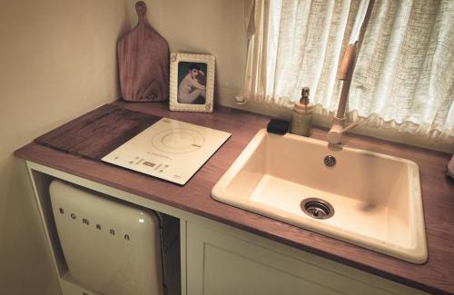 Aewol Apartment | Relax at BeachBoys - Retro Caravan Airstream with Ocean Views