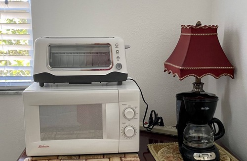 Tarpon Springs Apartment | Relaxing Beaches Sunset with Free Bicycles and Ocean View
