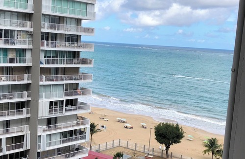 Isla Verde Apartment | Beachfront Oasis: Carolina Coral Beach Apts with Ocean View