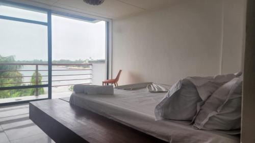 Kribi Apartment | Seaside Retreat: Beachfront Apartment for Family Enjoyment