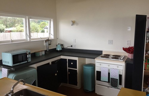 Northland House | Beachfront Bliss at Taupo Bay with Family-Friendly Amenities