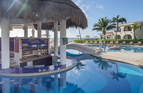 Playacar Condo | Beachfront Escape: Xaman Ha 7018 with Pool & Breakfast