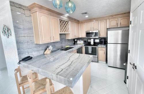Sandy Beach Apartment | Beachfront Condo on Sandy Beach, Las Palmas Resort, 24hrs Security, Free Parking, Free Wi-Fi