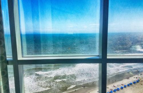 Downtown Myrtle Beach Apartment | Ocean Front Corner Unit with Private Pool & Hot Tub