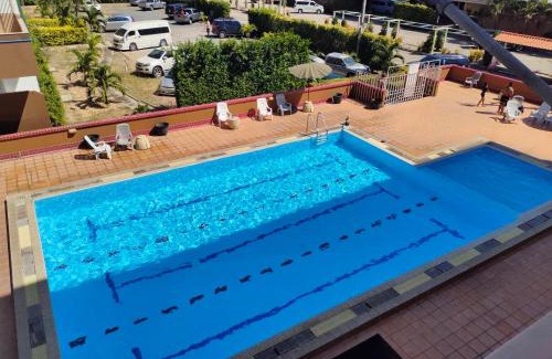 Rayong Apartment | Beachfront Family Room: Relax with Ocean Views & Pool Access
