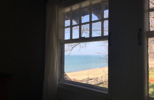 Dunkirk Condo | Beachfront Historical Retreat with Balcony & Pool Access