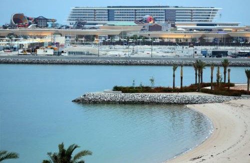 Lusail Apartment | Oceanfront SeaView Home with Private Beach and Pool