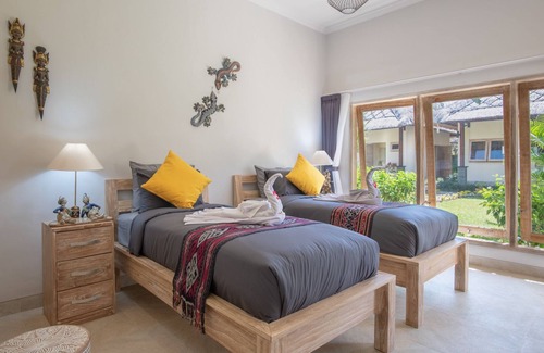 Dencarik Resort | Relaxing Beachfront Resort with Garden View Villas