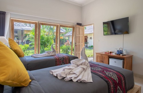 Dencarik Resort | Relaxing Beachfront Resort with Garden View Villas