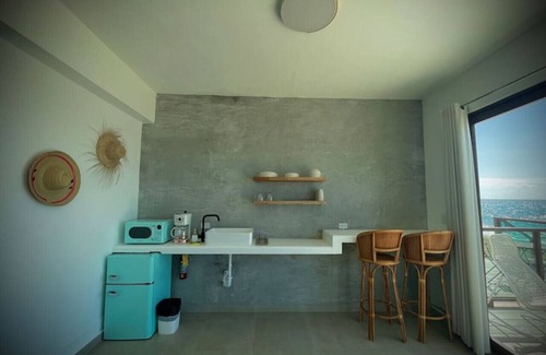 Stella Apartment | Corcega Beachfront Suites: Ocean View Retreat for Families