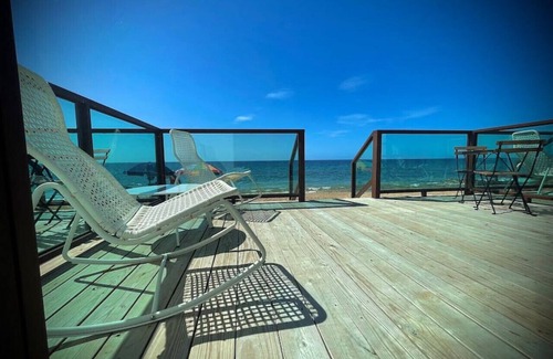 Stella Apartment | Corcega Beachfront Suites: Ocean View Retreat for Families