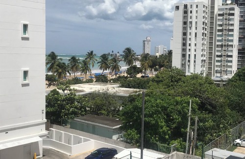 Isla Verde Condo | Beachfront Condo with Pool & Ocean View - Rated 10/10