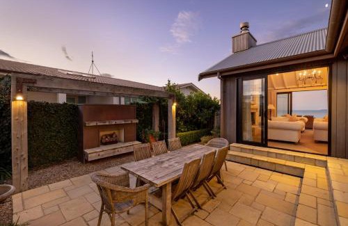 Papamoa Beach House | Scenic Beachfront Mediterranean Villa with Ocean View