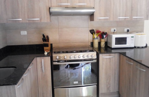 Torio Apartment | Beachfront Nature Rentals: Cozy Couple's Suite Retreat