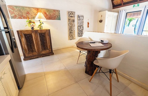 Isla Mujeres Cottage | Beachfront Palapa Cottage with Heated Pool & Tropical Gardens