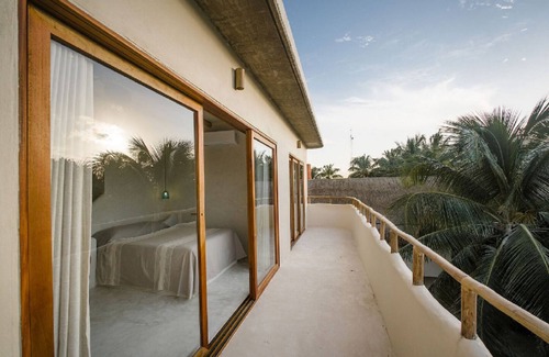 Zona Hotelera Condo | Elegant Beachfront Penthouse with Ocean Views in Tulum