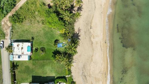 Asomante Apartment | Oceanfront Beach Studio in Aguada with Family Amenities
