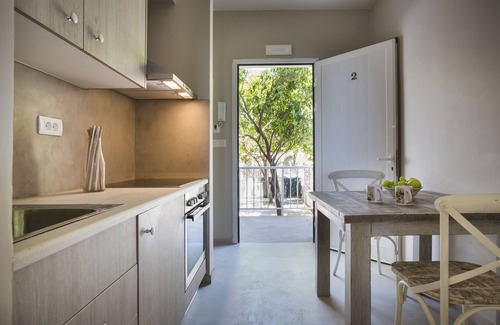 Lourdata Apartment | Beachfront Studio No 2: Steps from the Shore with Breakfast
