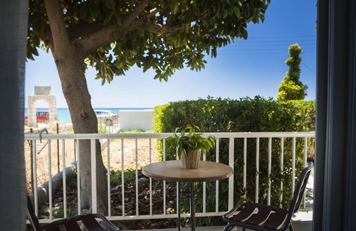 Lourdata Apartment | Beachfront Studio No 2: Steps from the Shore with Breakfast