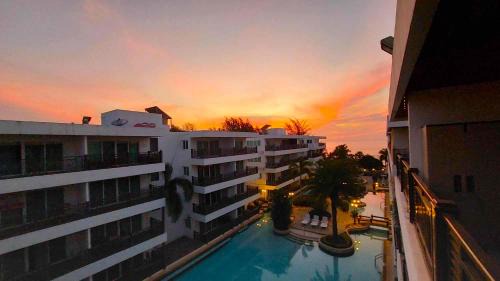 Cha-am Apartment | Beachfront Apartment with Pool, Balcony & Ocean Views