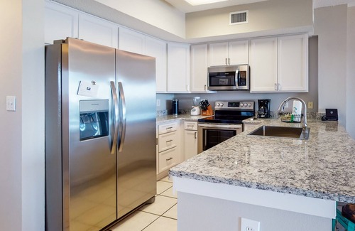 Orange Beach Condo | Beachfront Escape: Balconies, Hot Tub & Family-Friendly Fun