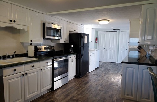 Elk Rapids House | Beachfront Rental with Tennis Court & Playground Nearby