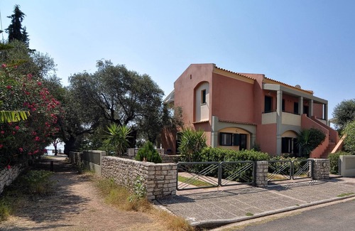 Barbati Apartment | Beachline Apt. with Garden, BBQ & Ocean Views - 10/10 Rated