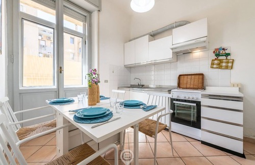 Poetto Apartment | Seaside Poetto Retreat with Breakfast and Family Amenities