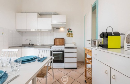 Poetto Apartment | Seaside Poetto Retreat with Breakfast and Family Amenities