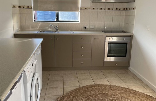 Dongara Apartment | Beachside 2-Bedroom Retreat with Pool and Ocean Views