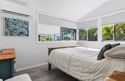 Pialba House | Beachside Serenity: Oceanfront Escape with Spa and Hot Tub