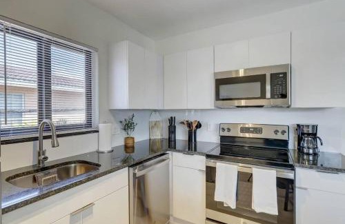 Imperial Point Apartment | Beachy & Boho Apartment for 6 with Pool and Pet-Friendly Perks