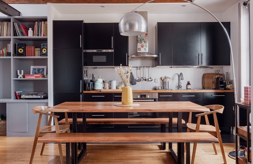 Clignancourt Apartment | Explore Beams and Dreams with Spa, Kitchen & Family Options