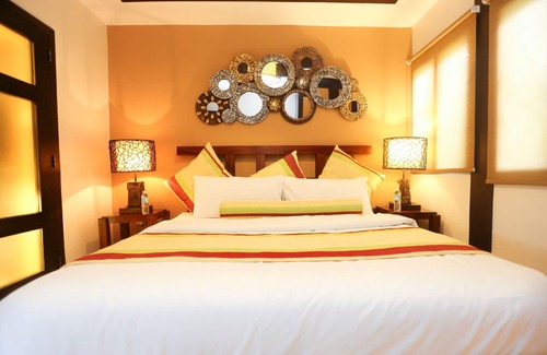 Tigbauan Resort | Discover Bearland Paradise Resort: Pool, Spa & Ocean Views