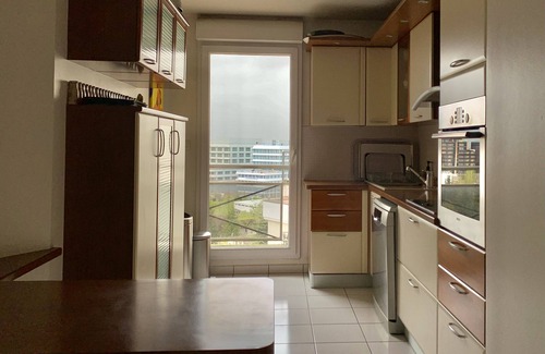 Faubourg de l'Arche Apartment | Elegant Duplex with Rooftop Terrace and Spa Amenities