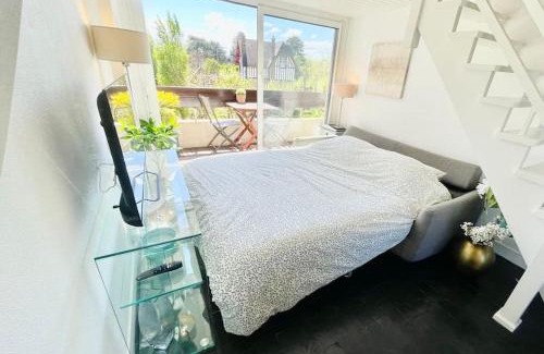Cabourg Apartment | Beautiful Duplex Loft Steps from Beach and City Center